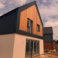 Metal and wood cladding on the back of a house