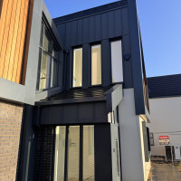 Metal cladding on the front of a new house